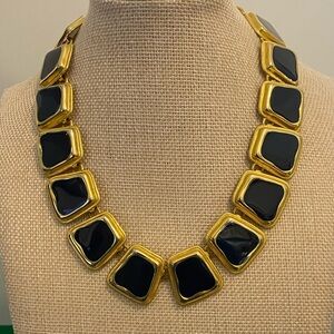 Dark blue statement necklace.